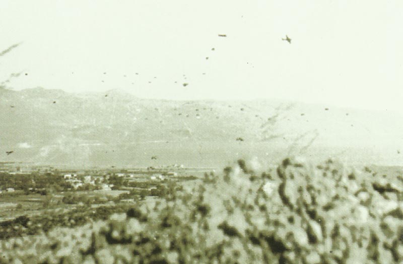 German paratroopers dropping from their transport planes over Maleme